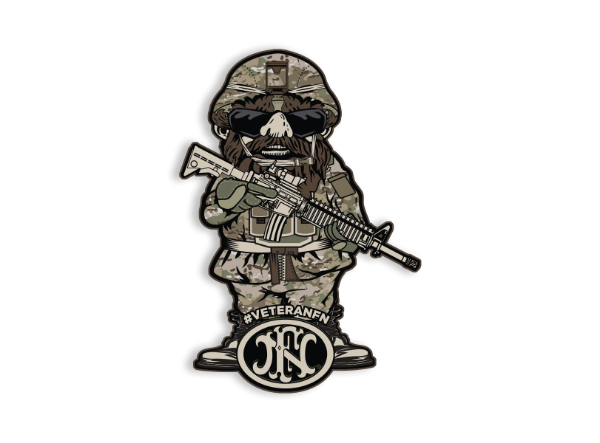 Veteran Gnome Decal, he is wearing camouflage clothes and holding a machine gun, with "#VETERANFN" written underneath and a dark version of the FN America logo.