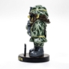 Camo dressed gnome bobble head side view